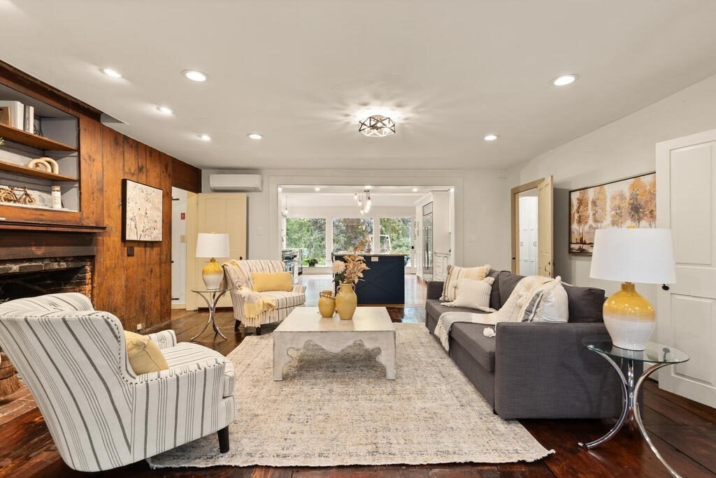 6 Lawrence Road Boxford, MA 01921 - Photo 8 of 42 a living room with fireplace furniture and a large window