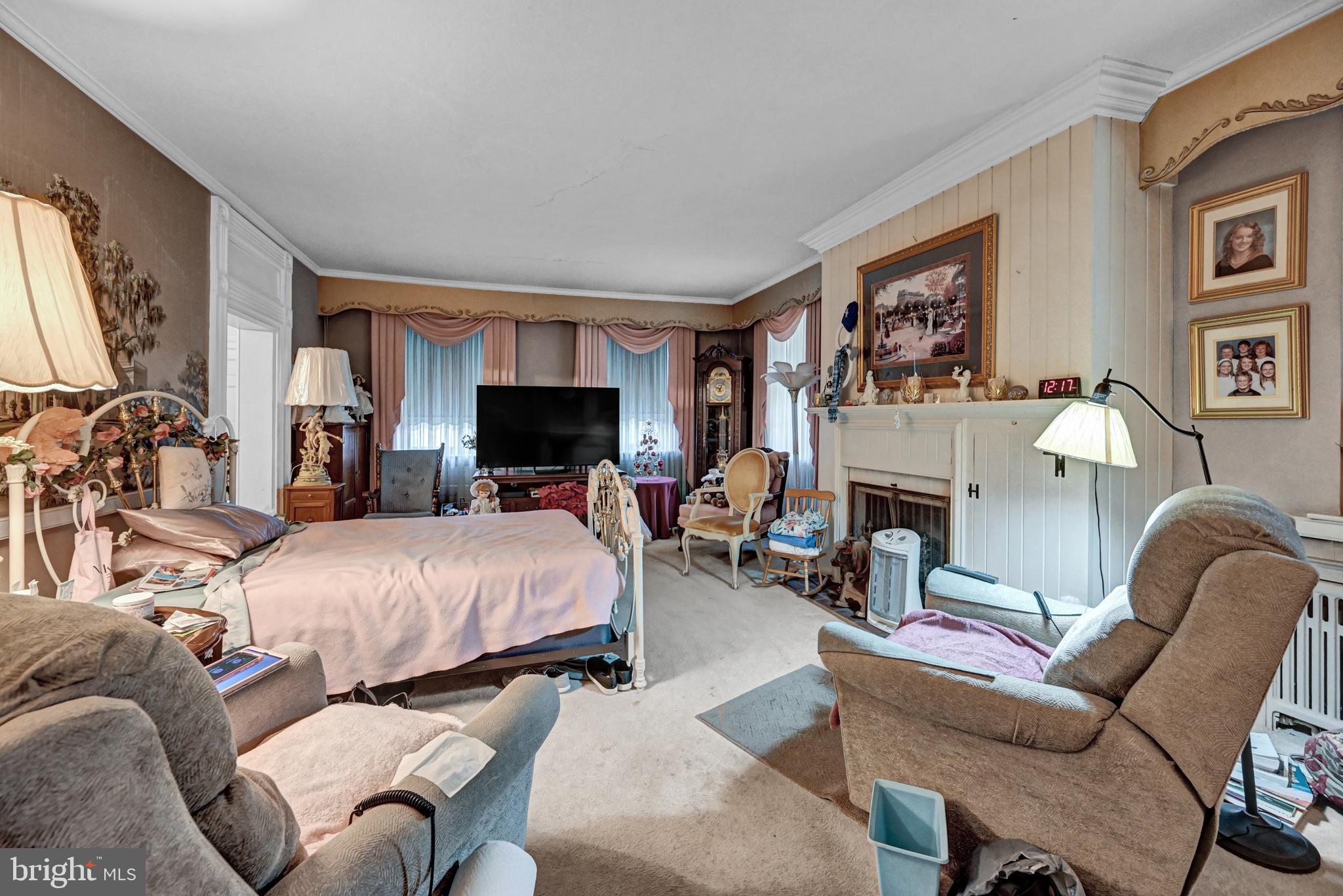 225 Moul Avenue Hanover, PA 17331 - Photo 30 of 81 a bed room with furniture and a fireplace