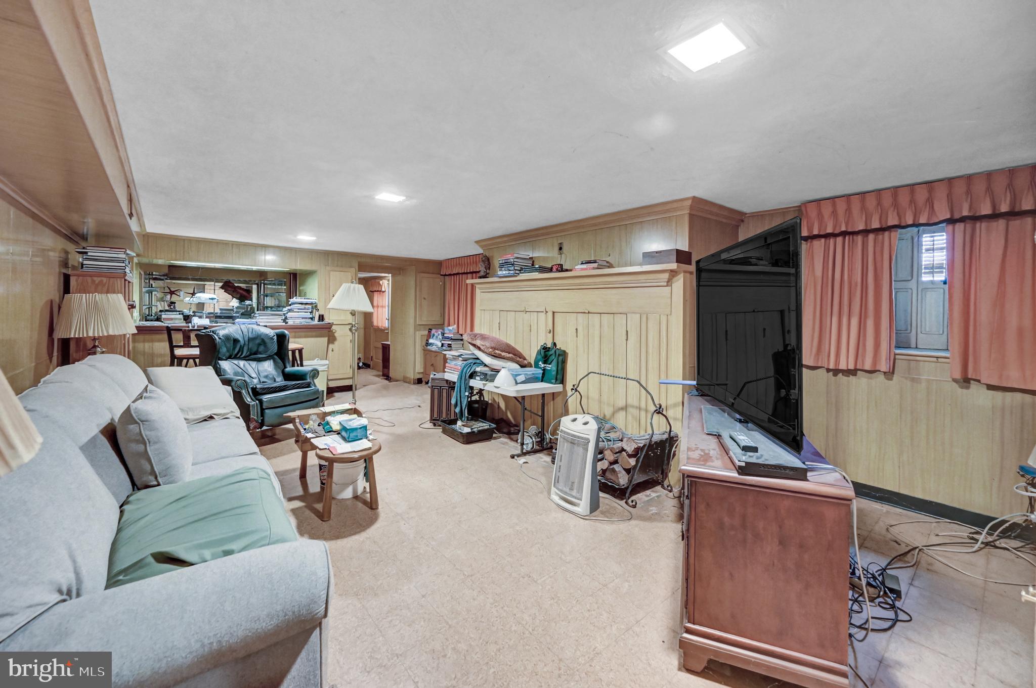 225 Moul Avenue Hanover, PA 17331 - Photo 35 of 81 a living room with furniture and a flat screen tv