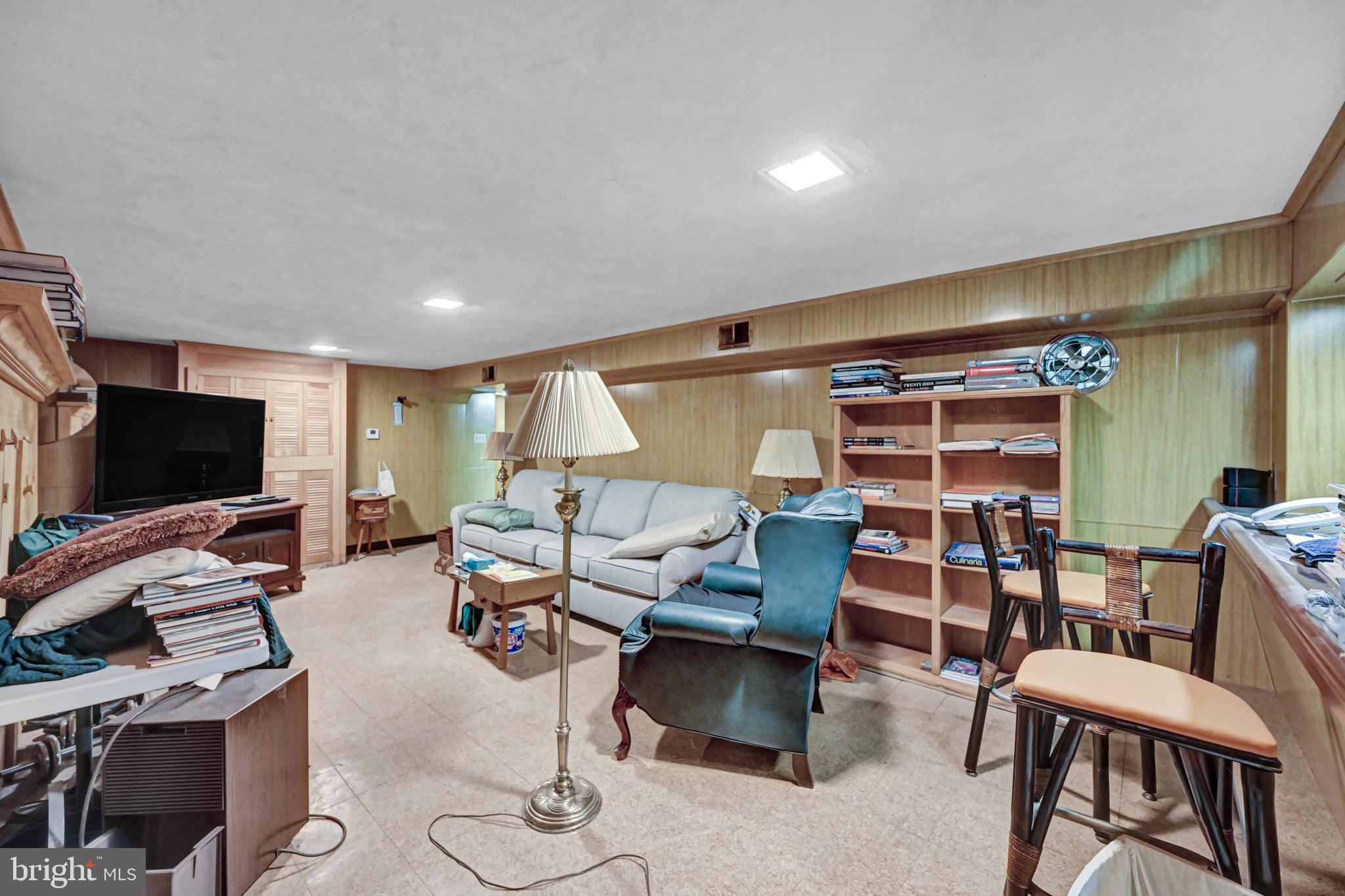 225 Moul Avenue Hanover, PA 17331 - Photo 36 of 81 a living room with furniture and a flat screen tv
