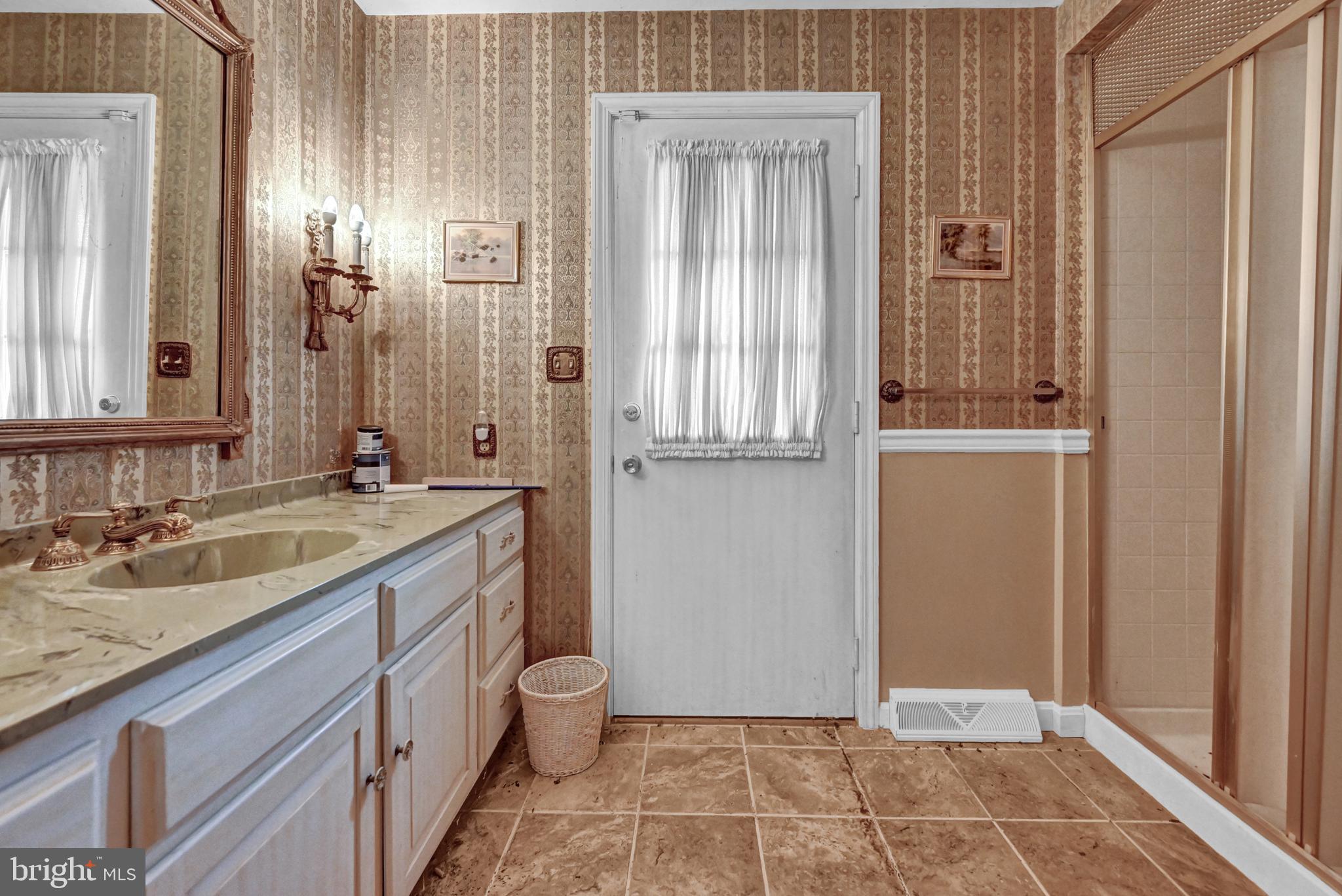225 Moul Avenue Hanover, PA 17331 - Photo 48 of 81 a bathroom with a granite countertop sink toilet and shower