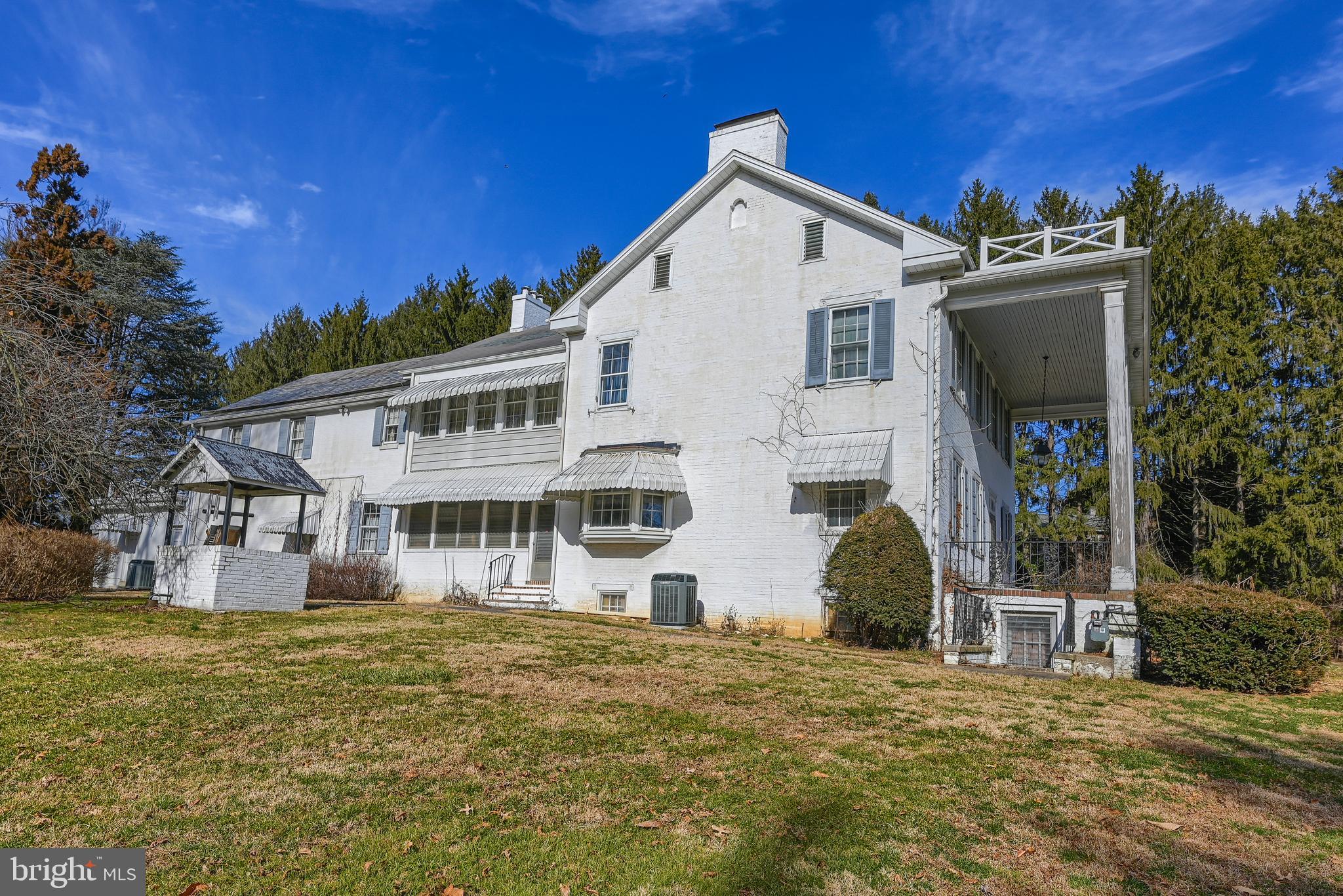 225 Moul Avenue Hanover, PA 17331 - Photo 5 of 81 a view of a white house with a yard