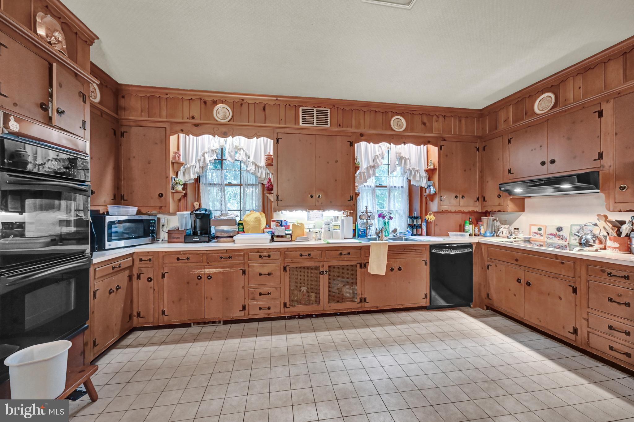225 Moul Avenue Hanover, PA 17331 - Photo 7 of 81 a large kitchen with stainless steel appliances granite countertop a stove a sink and a microwave