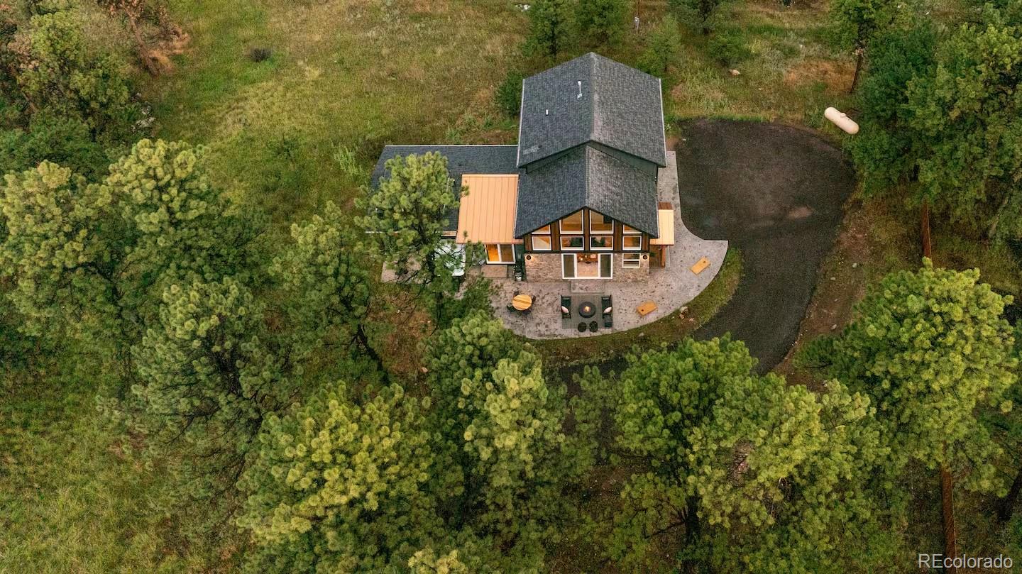 518 Conifer Drive Bailey, CO 80421 - Photo 46 of 50 an aerial view of a house with a yard