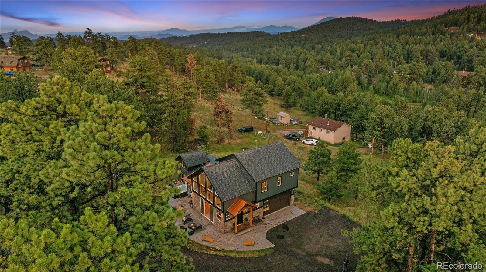 518 Conifer Drive Bailey, CO 80421 - Photo 47 of 50 an aerial view of a house with a yard