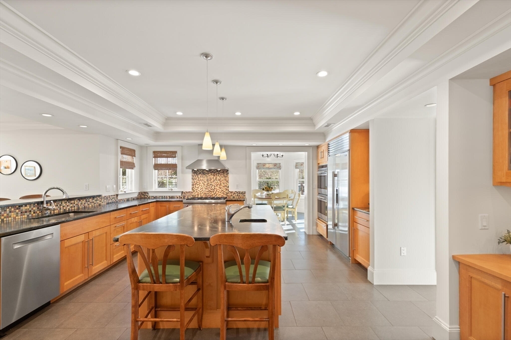 30 Underhill Road Lynnfield, MA 01940 - Photo 13 of 39 a living room with stainless steel appliances granite countertop furniture and a kitchen view