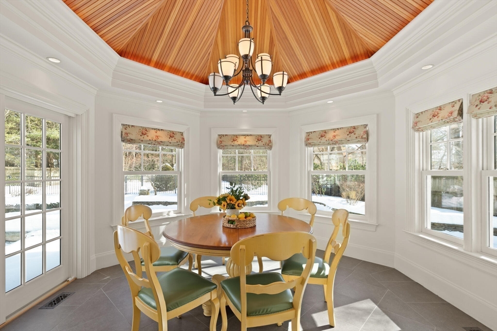 30 Underhill Road Lynnfield, MA 01940 - Photo 14 of 39 a view of a dining room with furniture wooden floor and chandelier