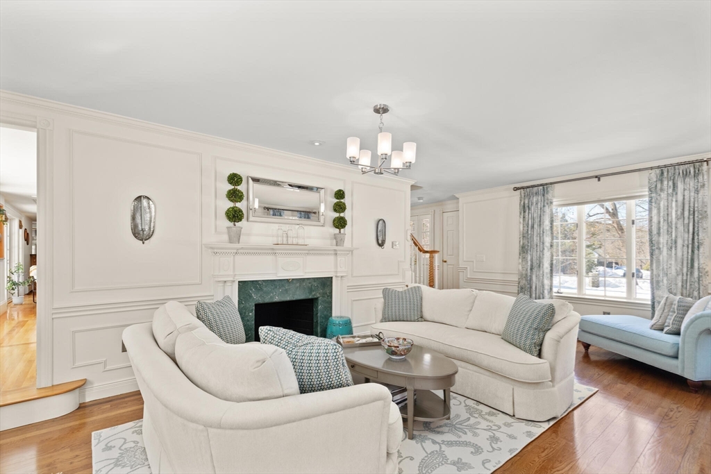 30 Underhill Road Lynnfield, MA 01940 - Photo 26 of 39 a living room with furniture and a fireplace
