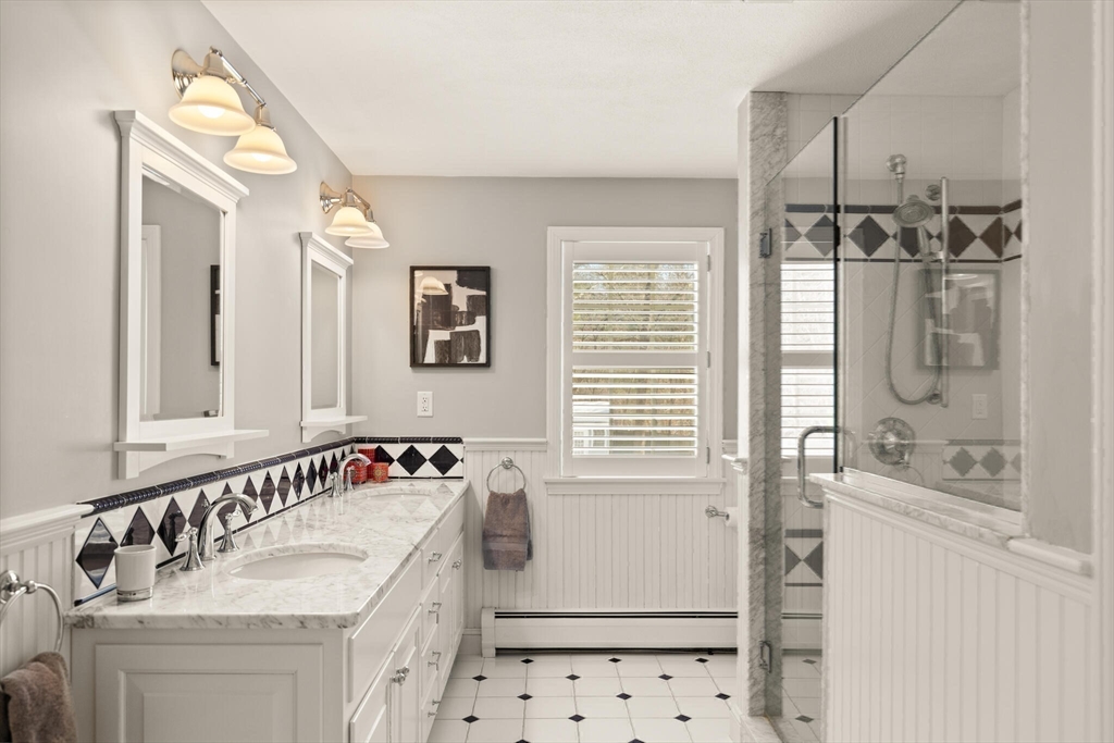 30 Underhill Road Lynnfield, MA 01940 - Photo 34 of 39 a bathroom with a tub sink and mirror