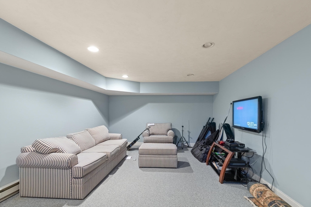 30 Underhill Road Lynnfield, MA 01940 - Photo 37 of 39 a livingroom with furniture and a couch