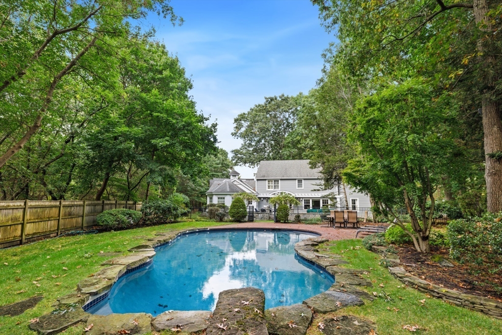 30 Underhill Road Lynnfield, MA 01940 - Photo 6 of 39 a view of a swimming pool with a patio