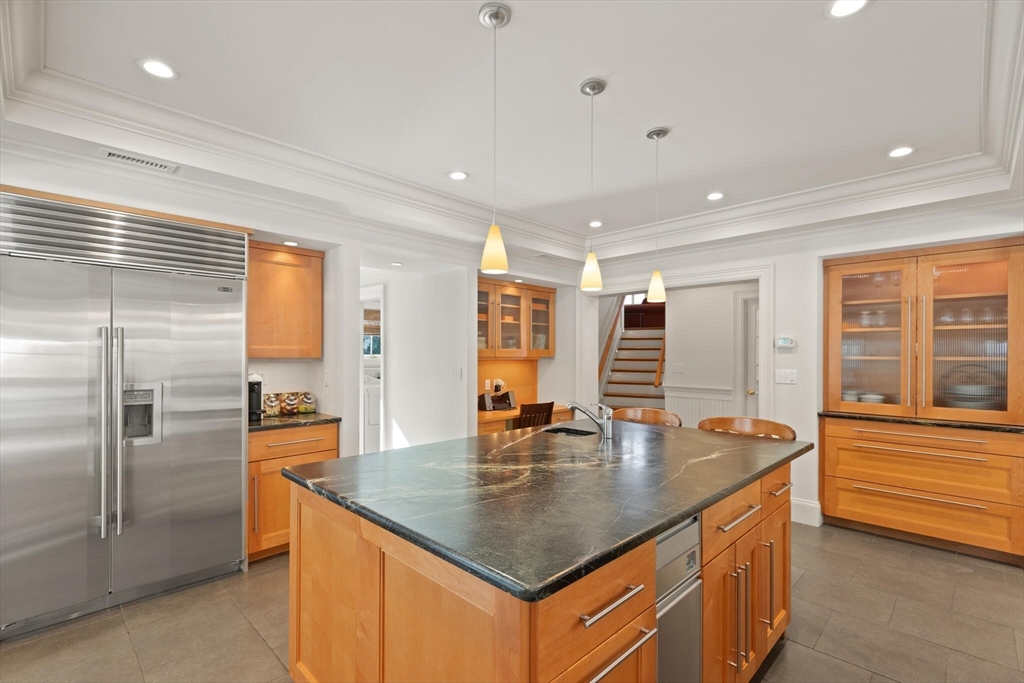 30 Underhill Road Lynnfield, MA 01940 - Photo 10 of 39 a kitchen with stainless steel appliances granite countertop a sink a oven and refrigerator