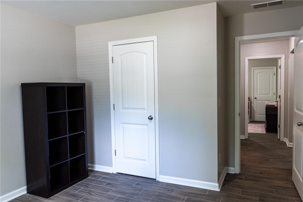 165 Pine Ridge Road Covington, GA 30016 - Photo 18 of 28 a view of a hallway