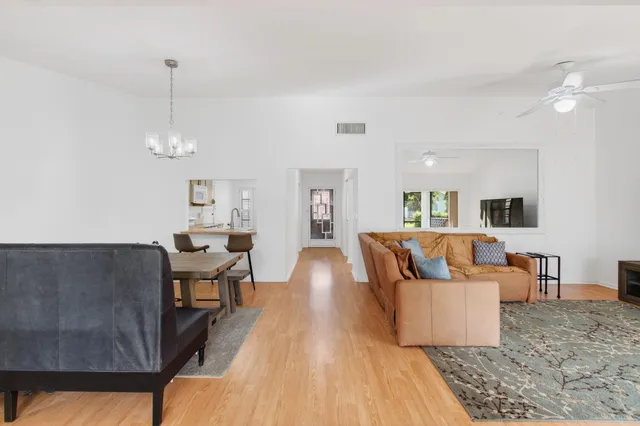 a view of a lake with a house in the background
