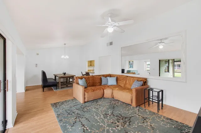 a bed room with a bed and a television