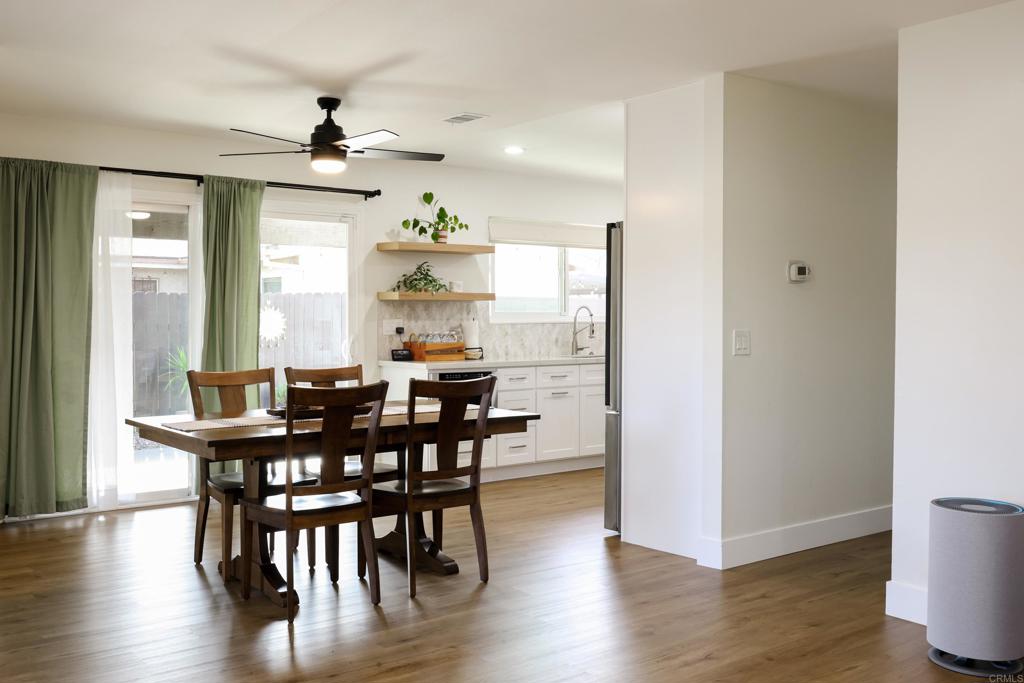 1024 Ransom Street San Diego, CA 92154 - Photo 14 of 41 a view of a a dining room with furniture window and wooden floor
