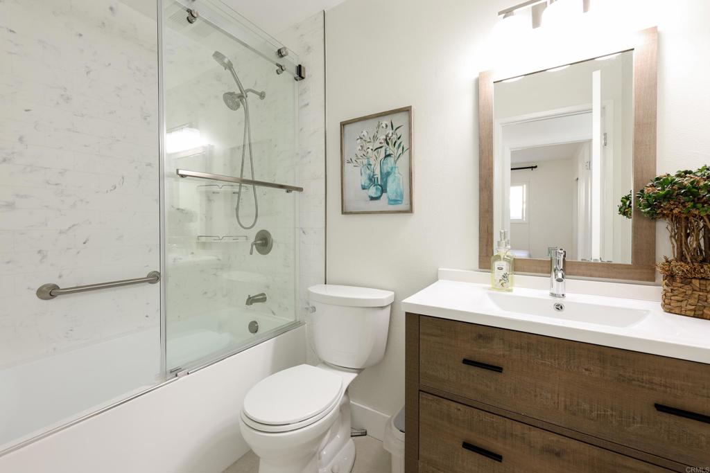 1024 Ransom Street San Diego, CA 92154 - Photo 20 of 41 a bathroom with a sink a toilet and shower