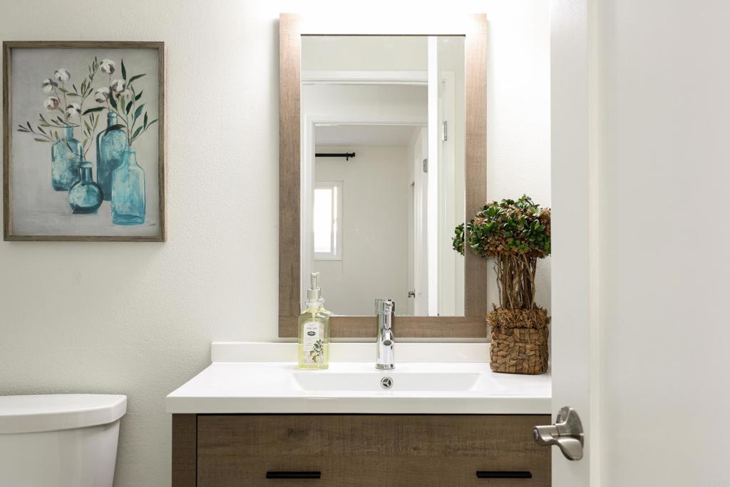 1024 Ransom Street San Diego, CA 92154 - Photo 21 of 41 a bathroom with a sink and a toilet