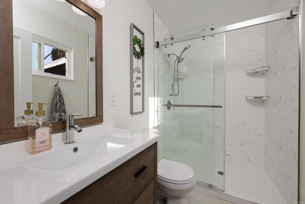 1024 Ransom Street San Diego, CA 92154 - Photo 25 of 41 a bathroom with a sink toilet and shower
