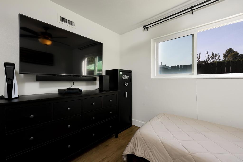 1024 Ransom Street San Diego, CA 92154 - Photo 28 of 41 a bedroom with a bed and a television