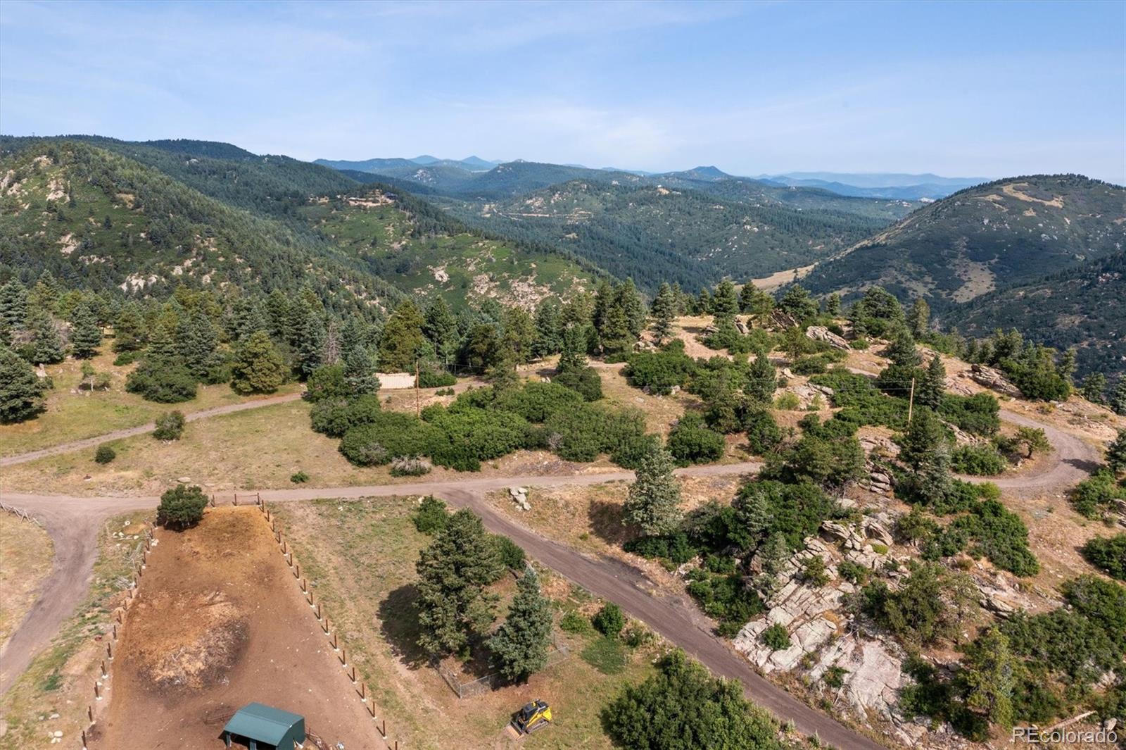 13854 North Trail Circle Littleton, CO 80127 - Photo 16 of 17 a view of a field with a mountain in the background