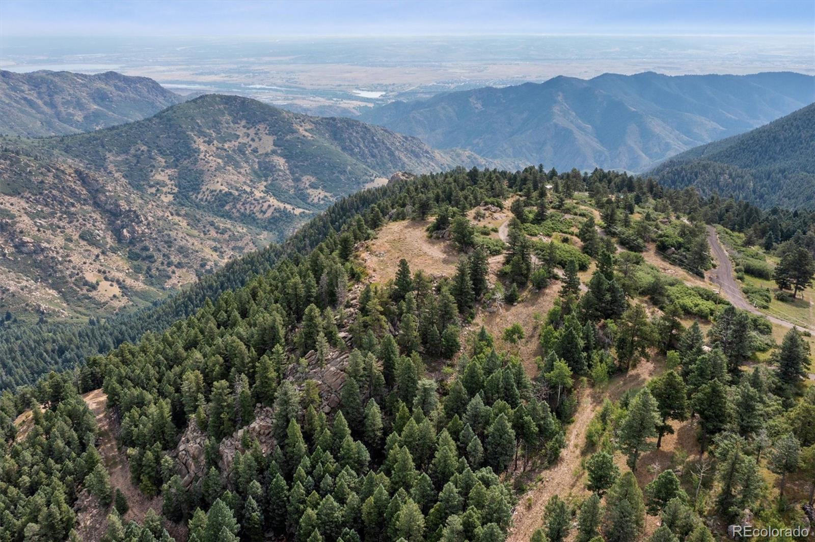 13854 North Trail Circle Littleton, CO 80127 - Photo 6 of 17 an aerial view of residential house and green space