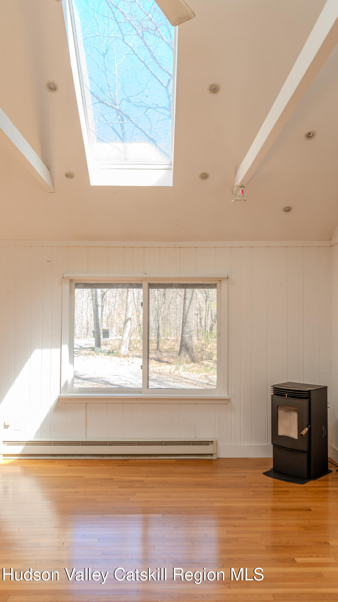 41 Pond Hill Road Copake, NY 12521 - Photo 12 of 25 a view of a room with wooden floor and a window