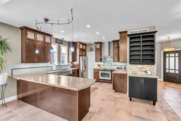 a bedroom with a bed and a book shelf