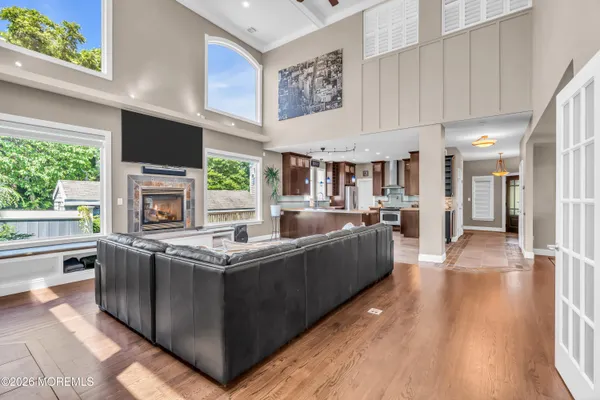 a bathroom with a toilet a sink and a window
