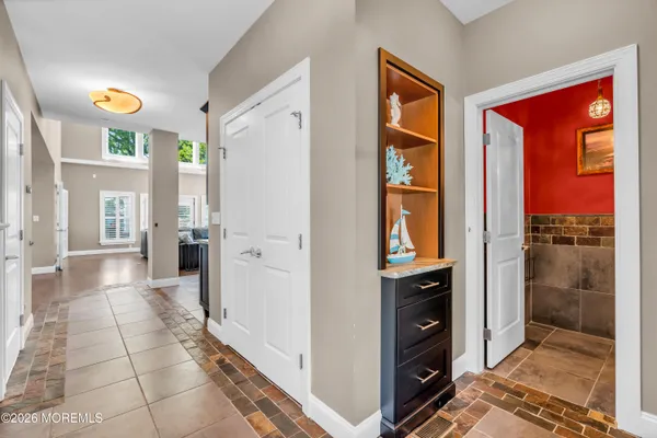 a living room with furniture fireplace and a flat screen tv