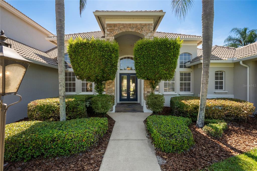2002 Water Key Drive Windermere, FL 34786 - Photo 3 of 60 a front view of a house