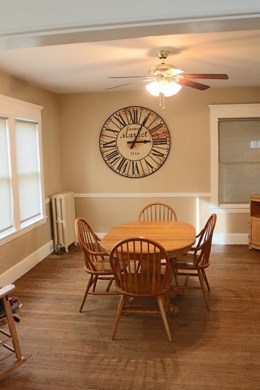 58 Larkspur Street Springfield, MA 01108 - Photo 11 of 29 a view of a dining room with furniture and wooden floor