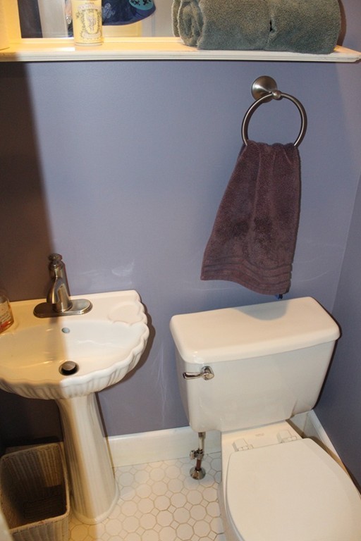 58 Larkspur Street Springfield, MA 01108 - Photo 17 of 29 a bathroom with a toilet and a sink