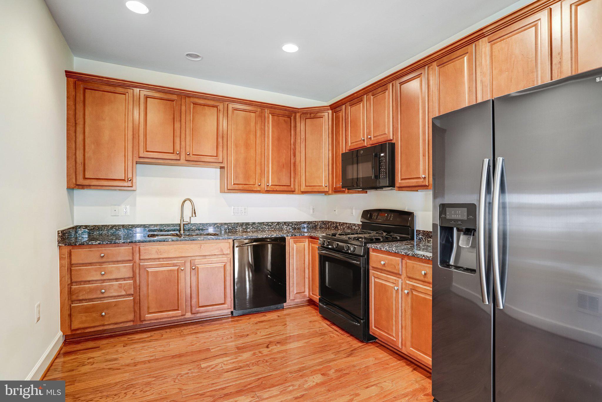 44406 Adare Manor Square Ashburn, VA 20147 - Photo 13 of 58 Upgraded Cabinets in Kitchen & Granite