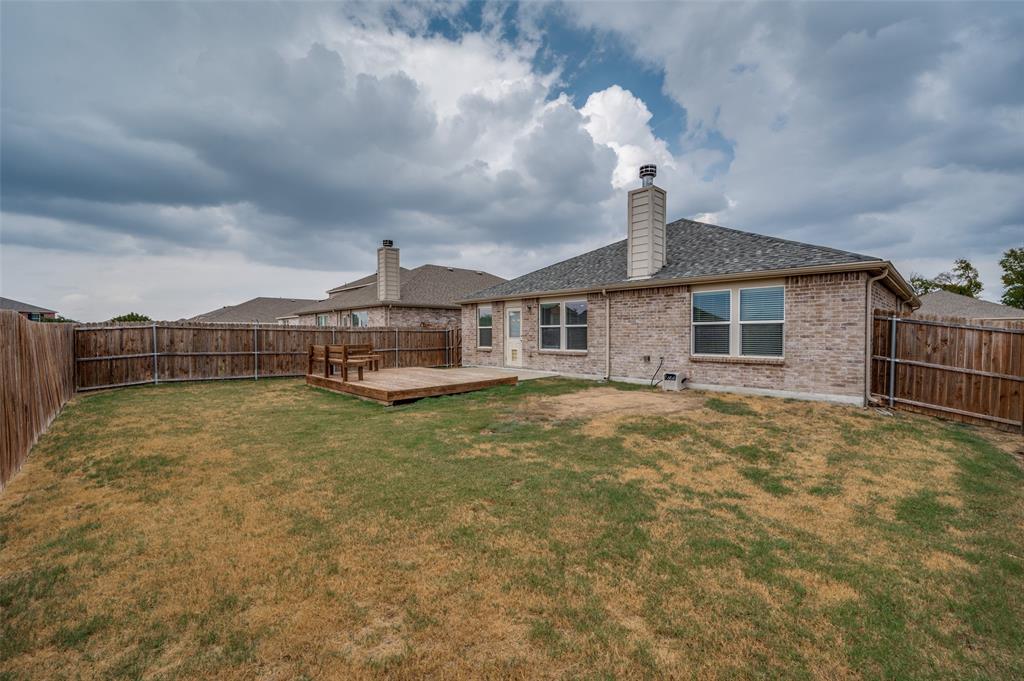 1420 Rivers Creek Lane Little Elm, TX 75068 - Photo 25 of 25 a front view of a house with a yard