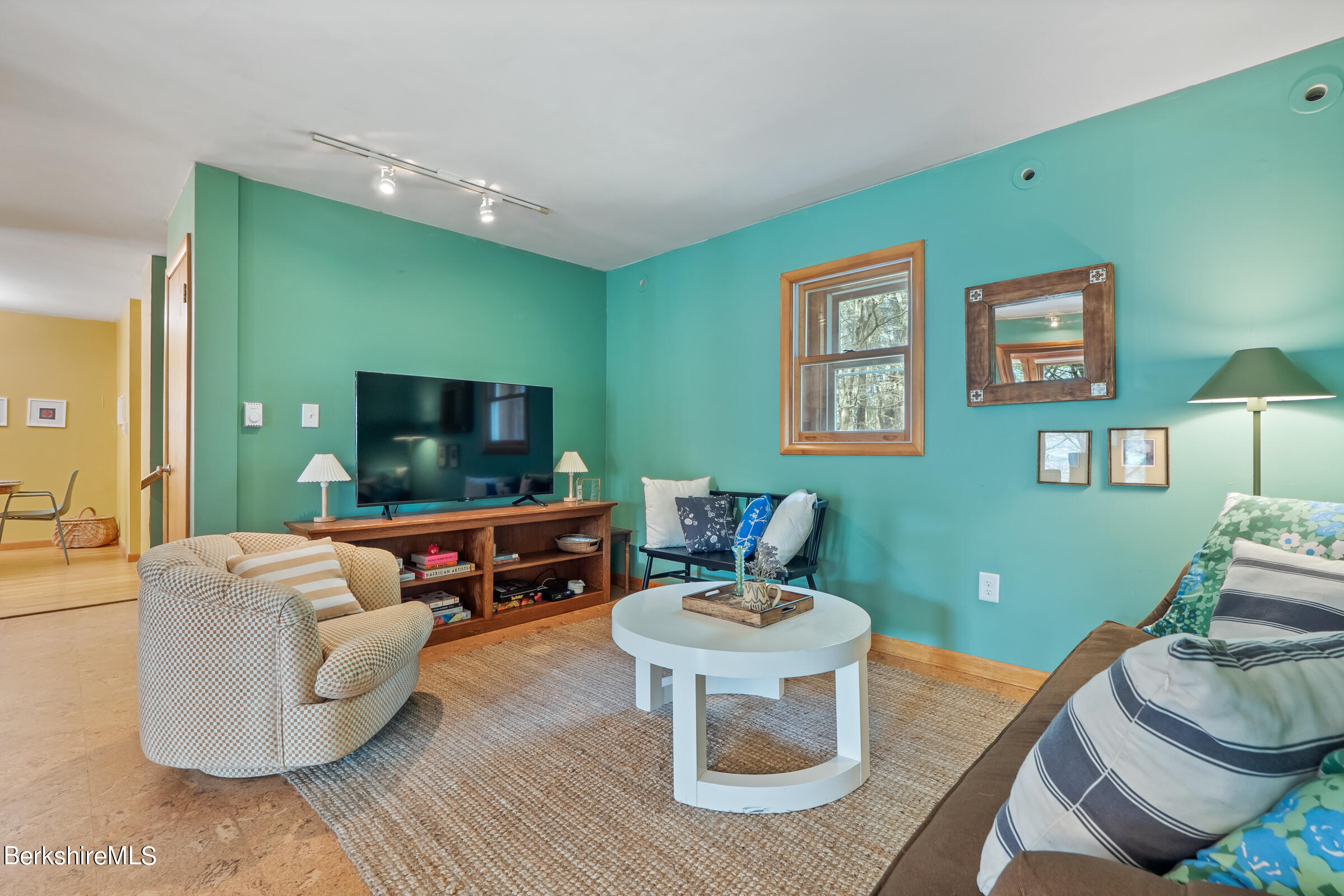 11 Pine Knoll Road Lenox, MA 01240 - Photo 11 of 35 a living room with furniture and a flat screen tv