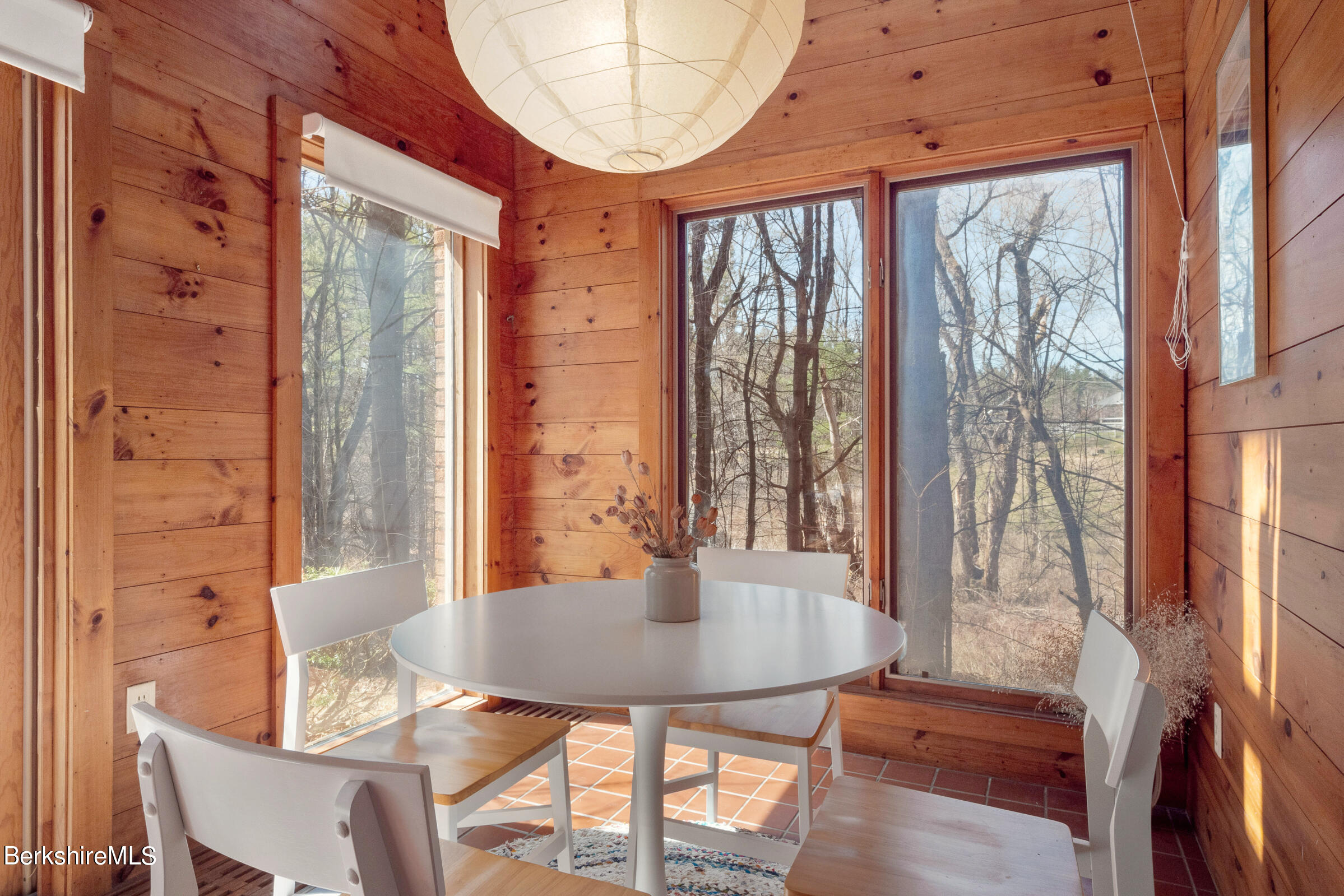 11 Pine Knoll Road Lenox, MA 01240 - Photo 15 of 35 a view of a dining room with furniture and a window