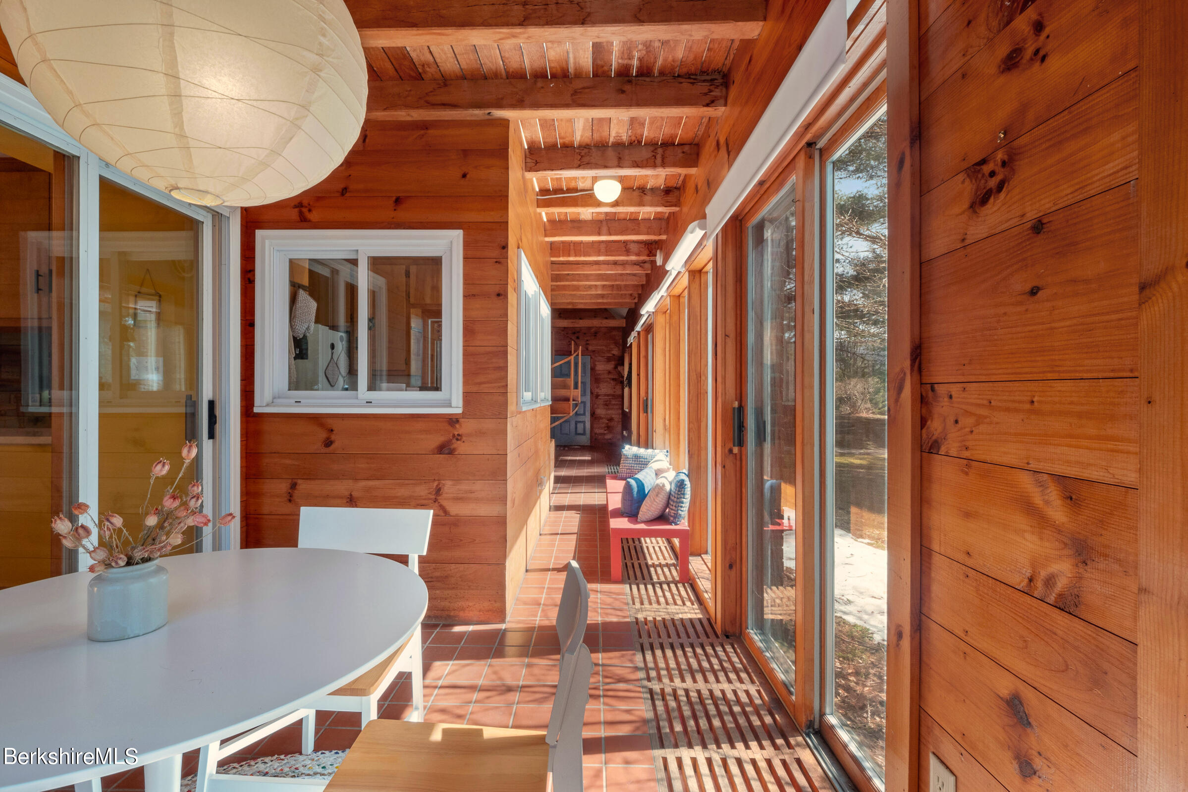 11 Pine Knoll Road Lenox, MA 01240 - Photo 16 of 35 a balcony view with a sitting space and glass windows