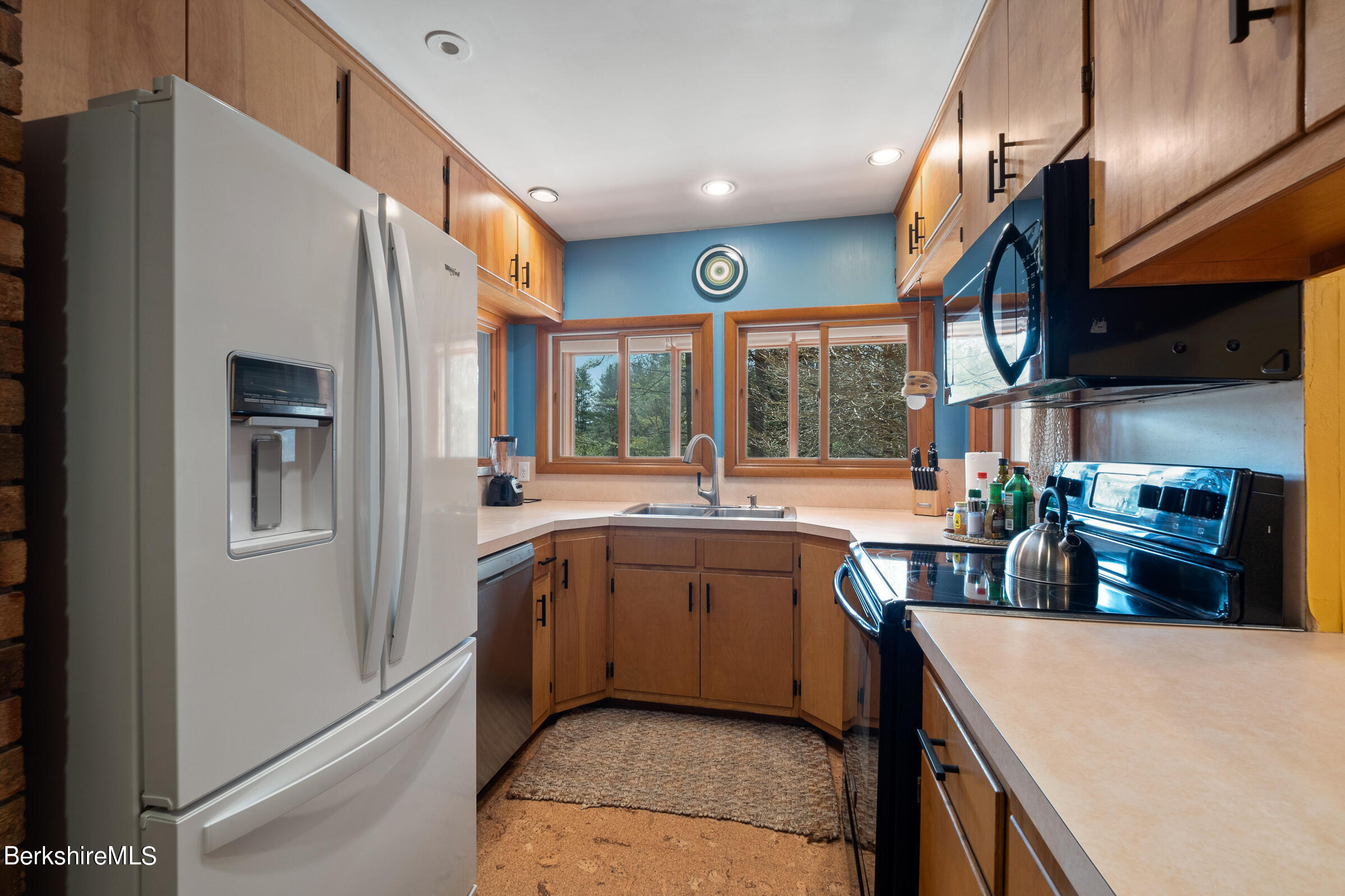 11 Pine Knoll Road Lenox, MA 01240 - Photo 20 of 35 a kitchen with stainless steel appliances granite countertop lots of counter top space