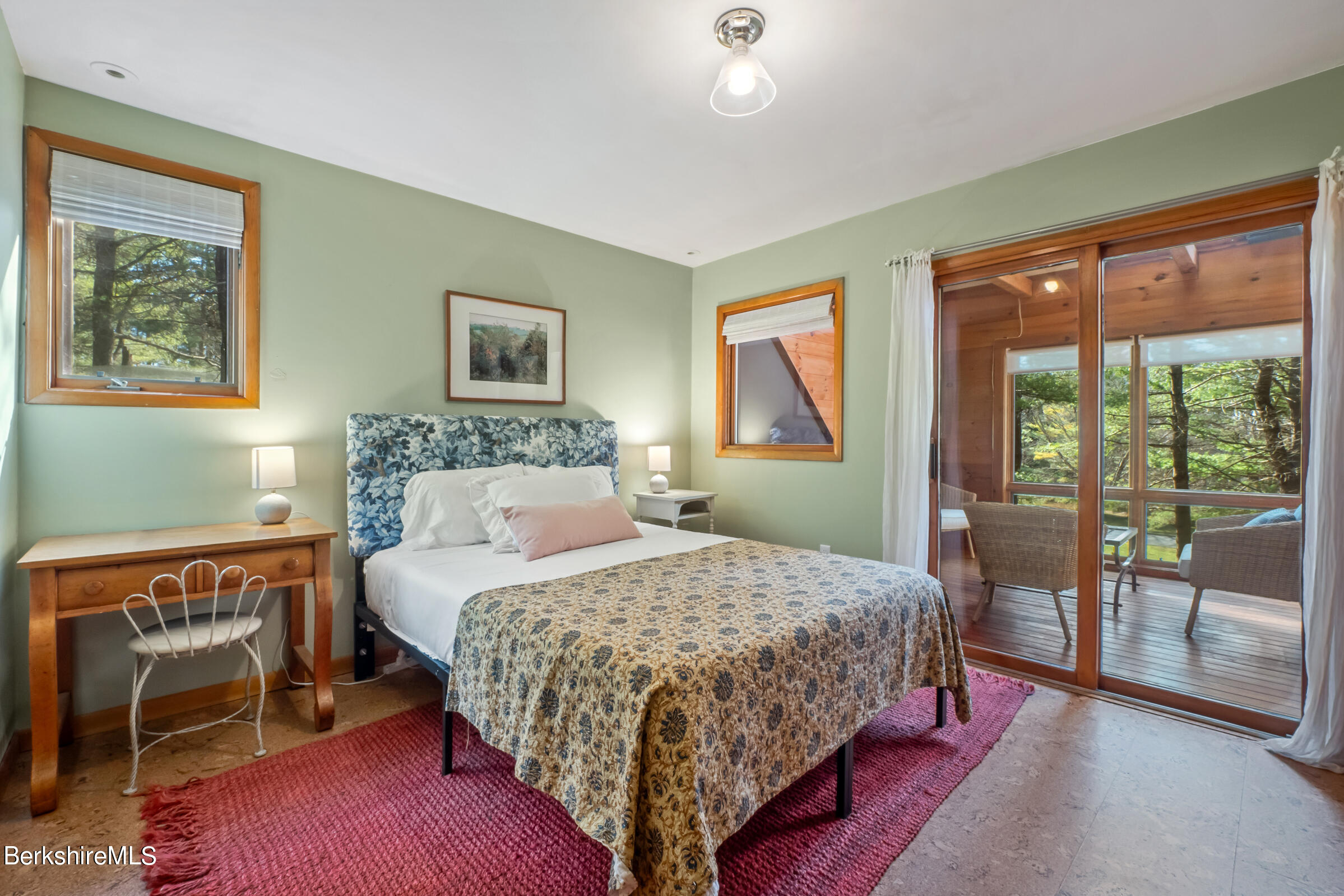 11 Pine Knoll Road Lenox, MA 01240 - Photo 30 of 35 a bedroom with a bed and a dresser next to a window