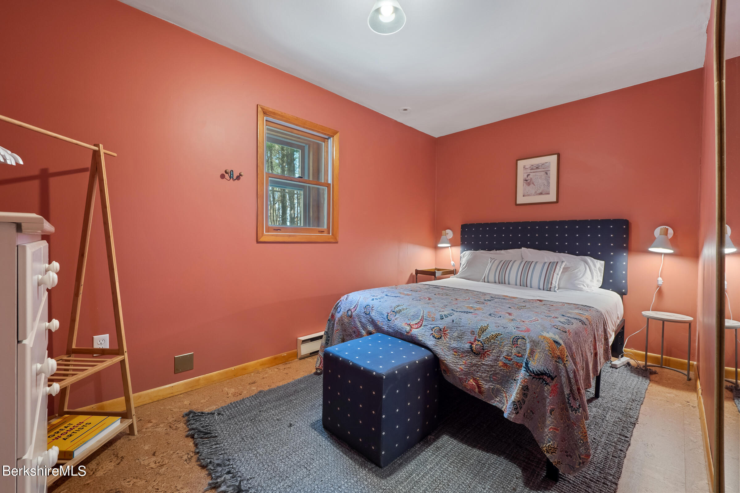 11 Pine Knoll Road Lenox, MA 01240 - Photo 32 of 35 a bedroom with a bed and a table