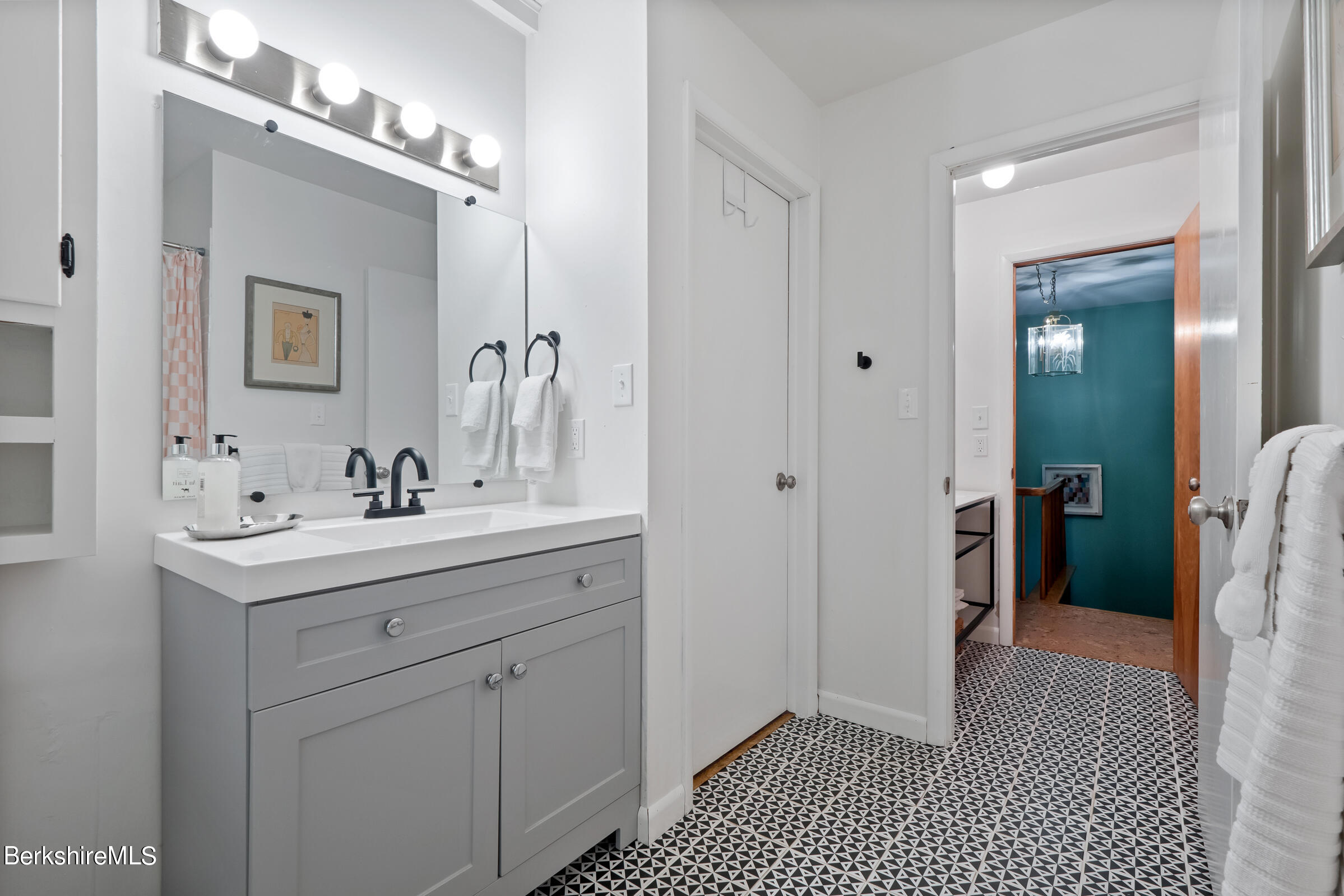 11 Pine Knoll Road Lenox, MA 01240 - Photo 33 of 35 a bathroom with a sink and a mirror