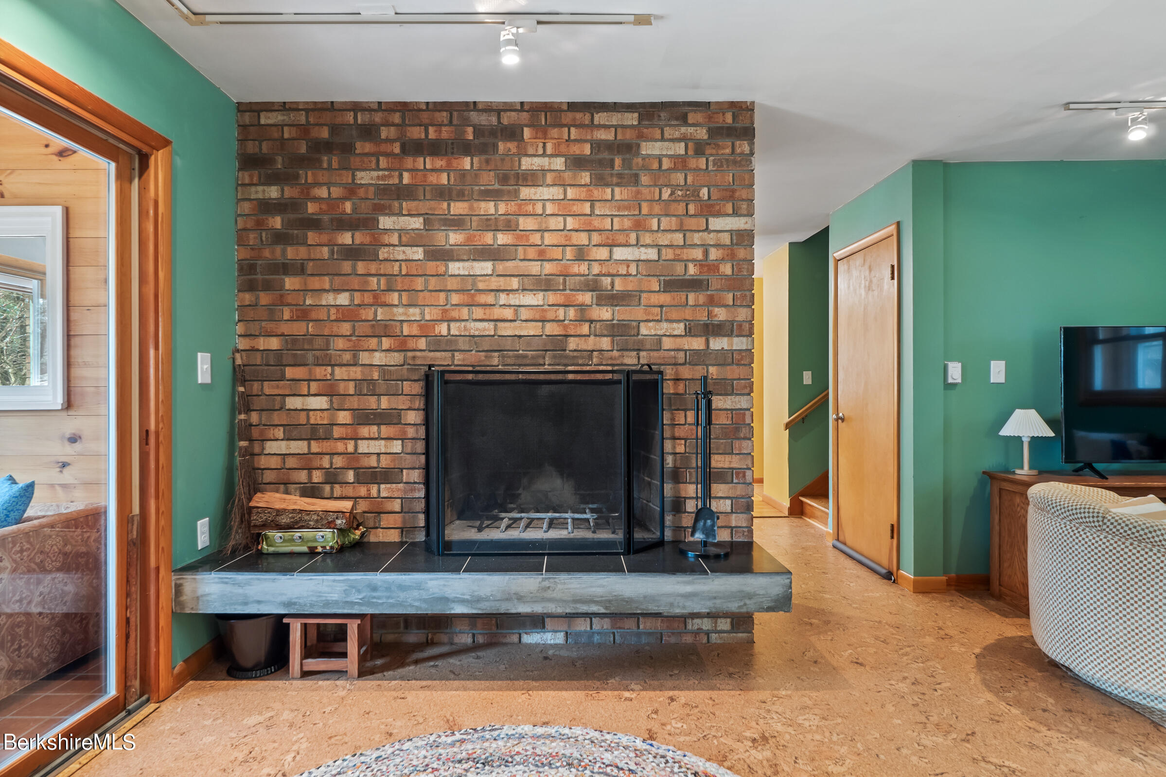 11 Pine Knoll Road Lenox, MA 01240 - Photo 10 of 35 a living room with fireplace furniture and a fireplace