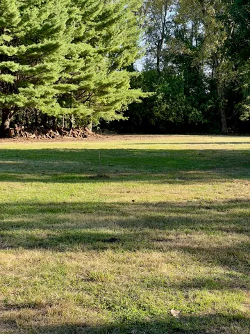 a view of a swimming pool and a lake view