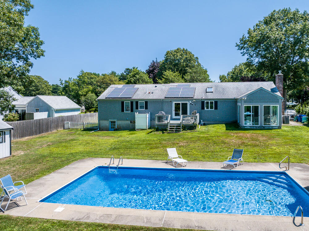 285 Prince Hinckley Road Centerville, MA 02632 - Photo 1 of 48 a view of house with garden space and swimming pool