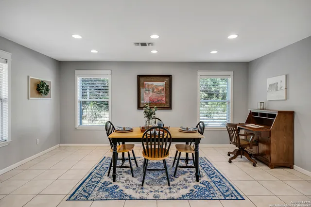 a workspace with furniture and a window