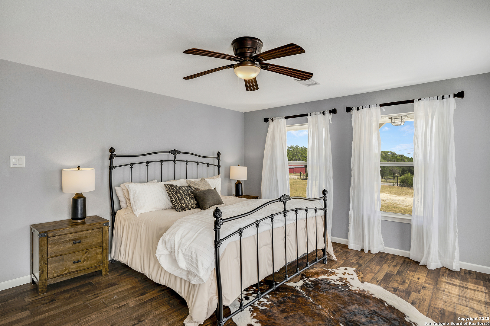 107 Ridge View Drive Boerne, TX 78006 - Photo 14 of 53 a bedroom with bed and a window