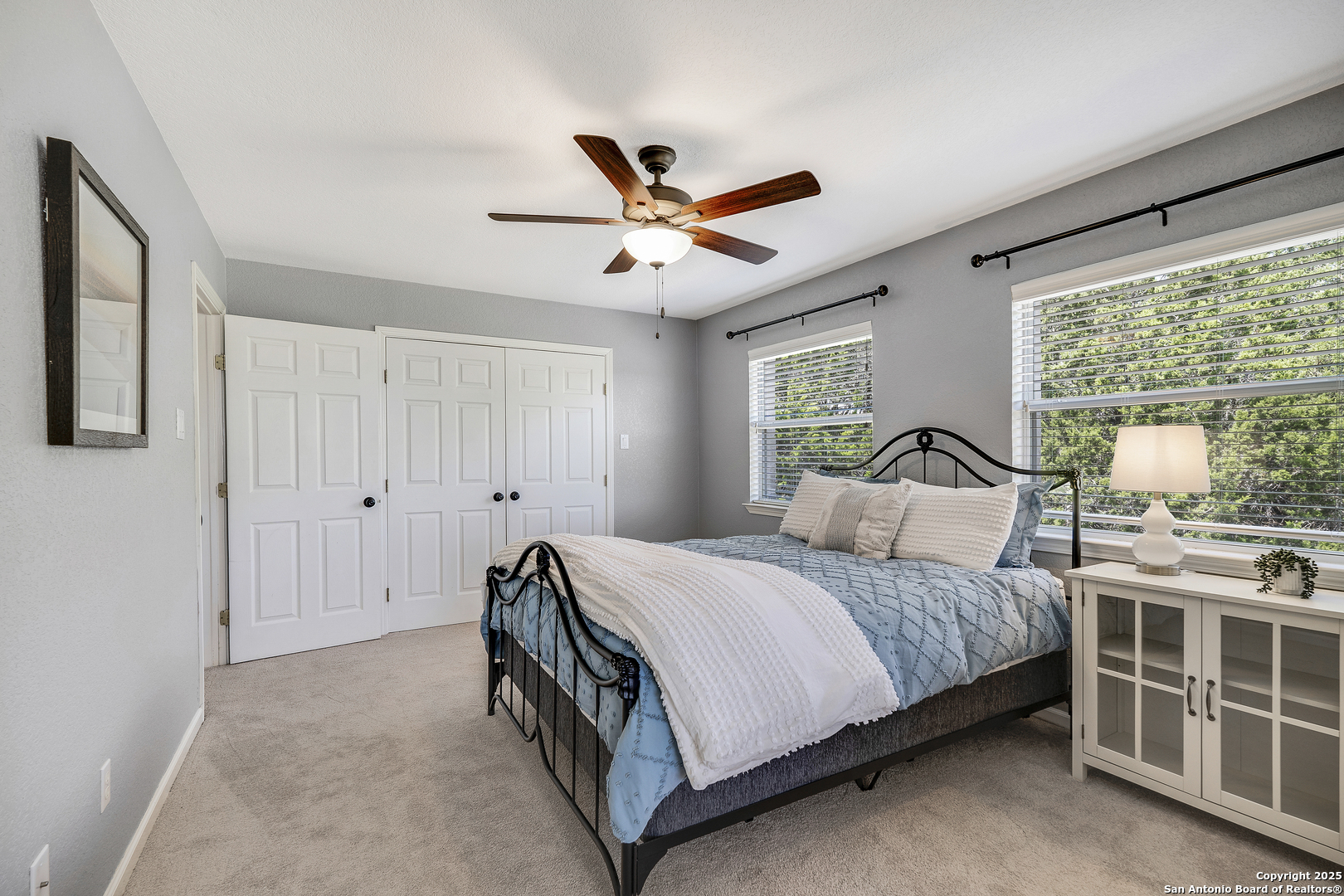 107 Ridge View Drive Boerne, TX 78006 - Photo 19 of 53 a bedroom with a bed and a window