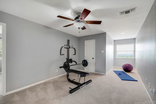 a view of a room with gym equipment