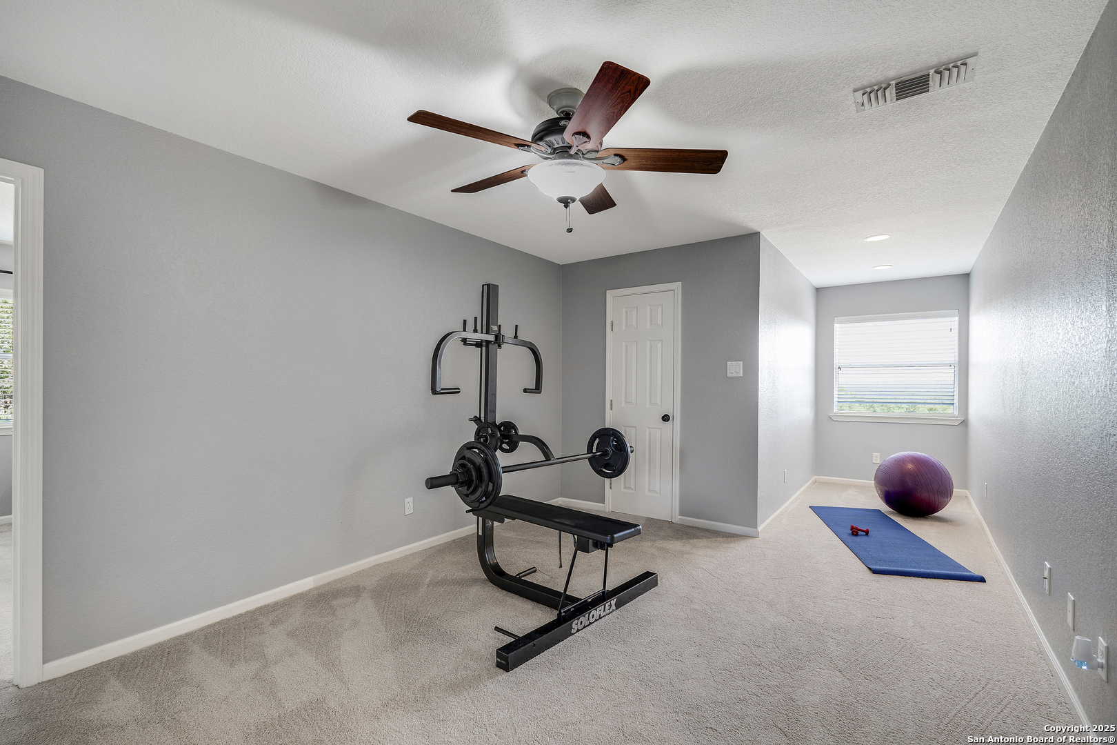 107 Ridge View Drive Boerne, TX 78006 - Photo 22 of 53 a view of a room with gym equipment